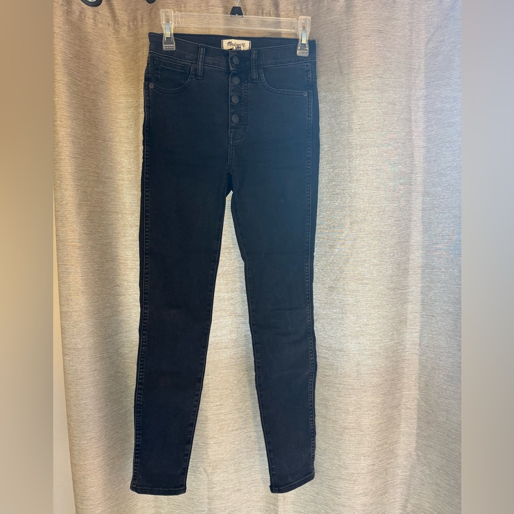 10” high rise Madewell skinny jeans with buttons up the front.